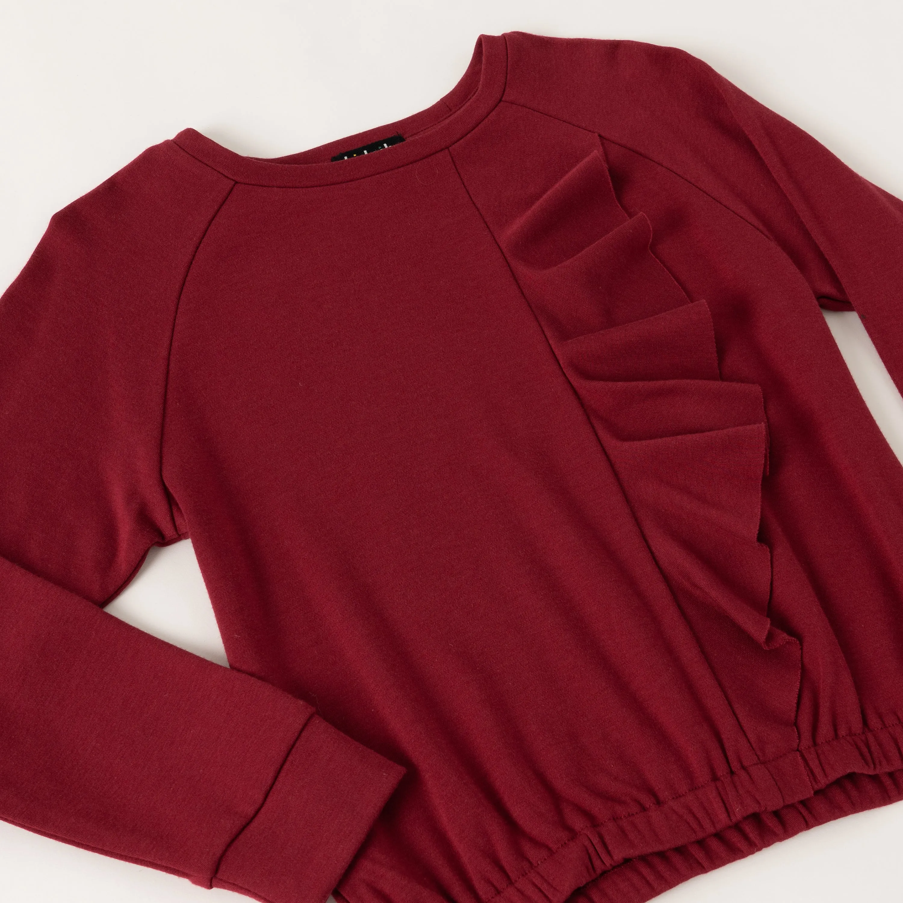 Cascading Ruffle Fleece Top