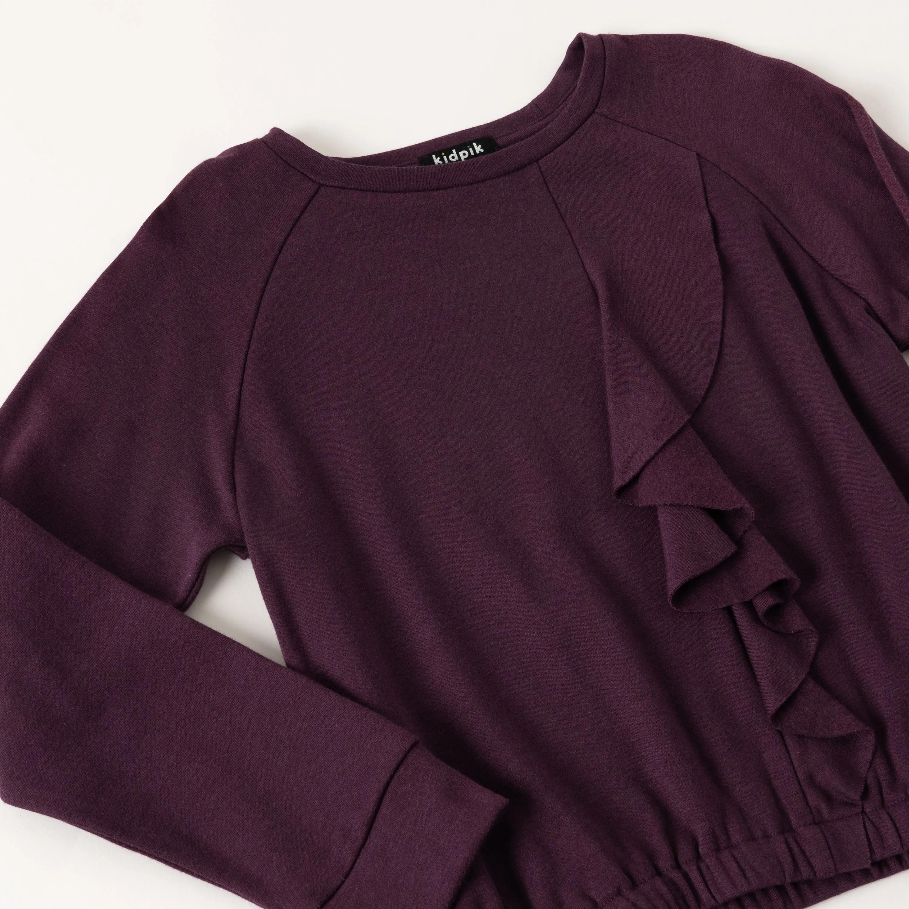 Cascading Ruffle Fleece Top
