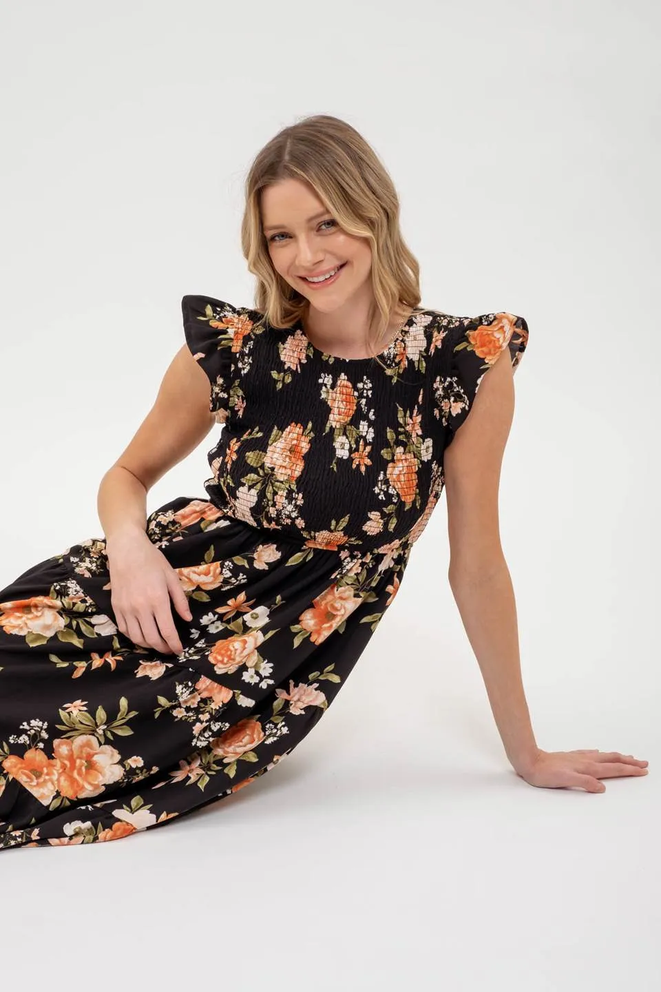 SMOCKED TIERED FLORAL MIDI DRESS